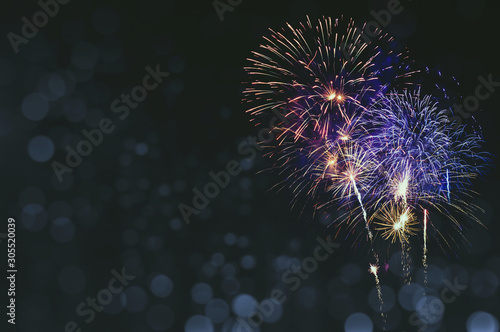 Abstract colored firework background with free space for text