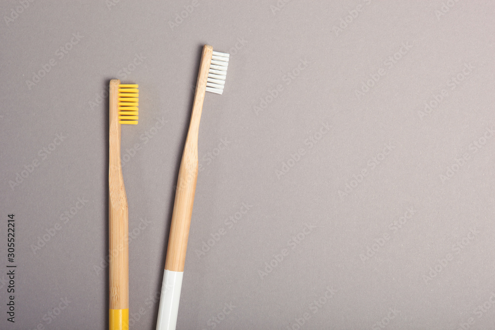 natural bamboo toothbrushes on an open background top view. Oral and dental care. natural bamboo toothbrushes on an open background top view. Oral and dental care.