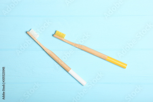 natural bamboo toothbrushes on an open background top view. Oral and dental care.