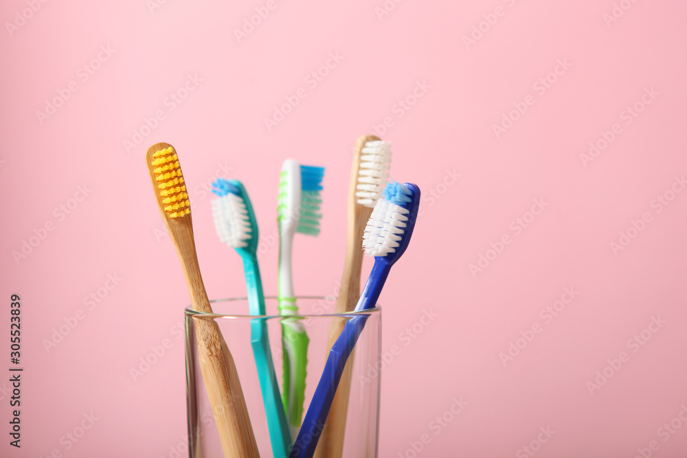 Natural bamboo and plastic toothbrushes on the table. Natural bamboo and plastic toothbrushes on the table.