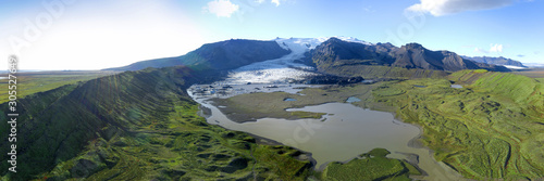 Icelandic aerial landscape. Panorama of the Fjallsarlon glacier and the lagoon at sunset. photo