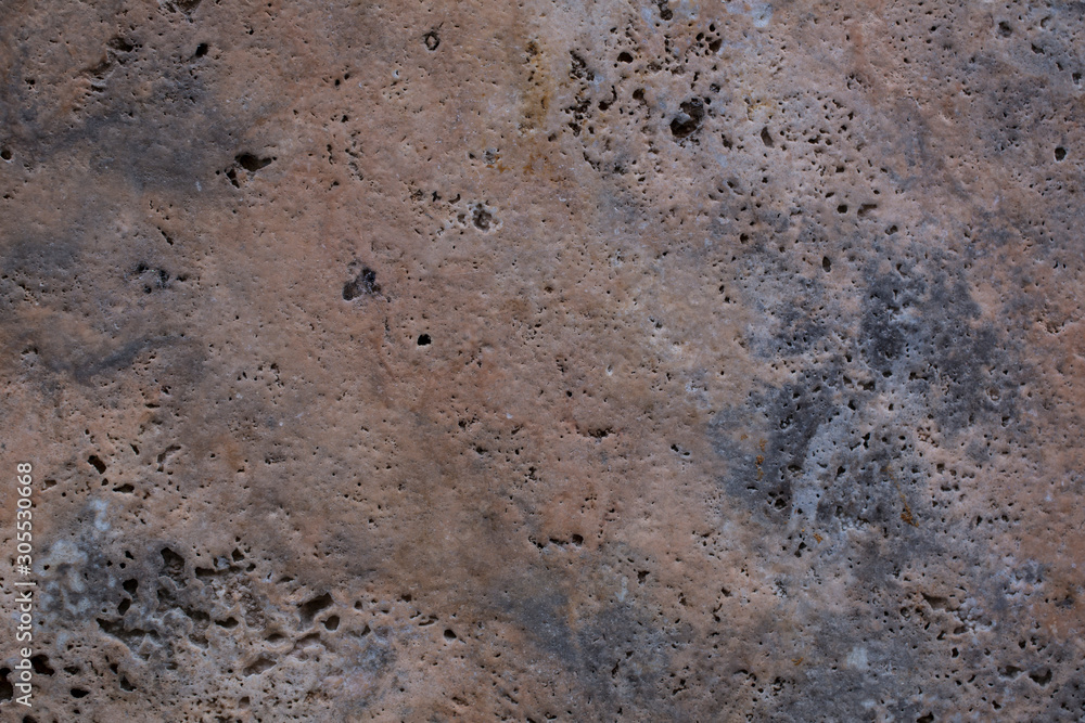 Wall of travertine with stone layers of different colors. Close up architecture macro photography. Creative wallpaper photography. Wall of travertine with stone layers of different colors. Close up architecture macro photography. Creative wallpaper photography.