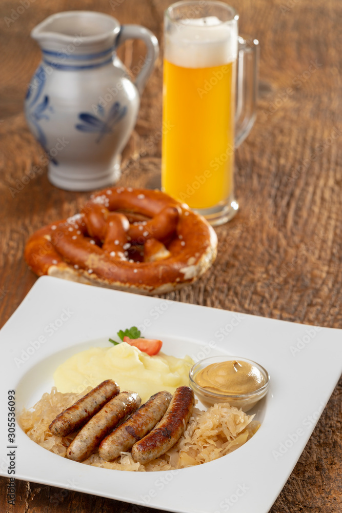 grilled nuremberger bratwurst with sauerkraut grilled nuremberger bratwurst with sauerkraut