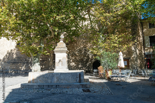 Fountain in medieval village of Gordes , Provence