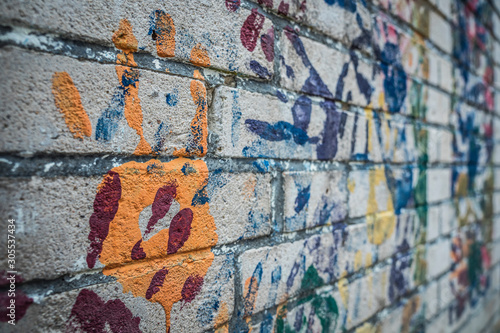 Wall with handprints on a playground. © roostler