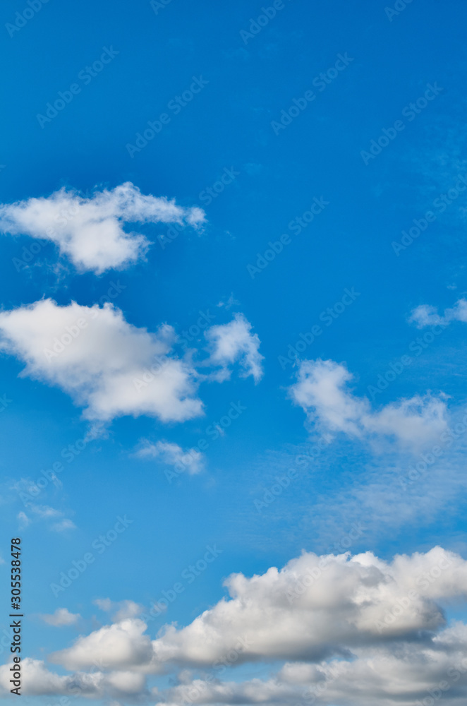 Beautiful sky and majestic clouds. White clouds and blue sky.