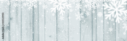 Christmas banner with white blurred snowflakes on wooden background. Merry Christmas and Happy New Year greeting banner. Horizontal new year background, headers, posters, cards, website. Vector 