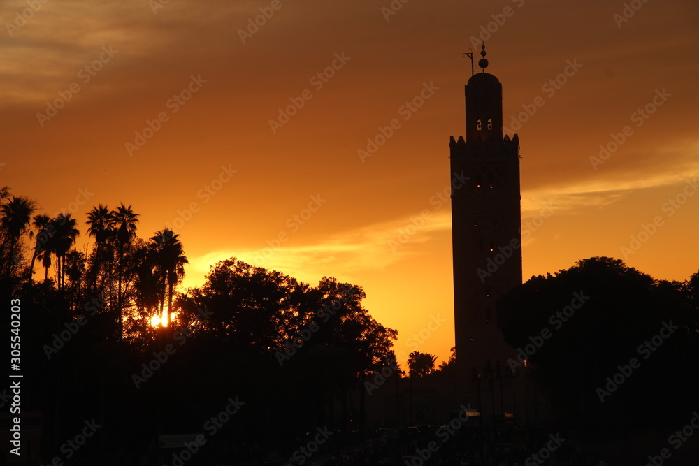 Panoramic view of the Sunset in the tower of the Marrakech square. Morocco