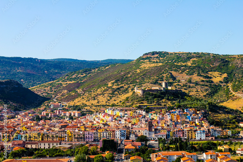 panoramic view of the town of Bosa known for its characteristic colorful houses, Sardinia, Italy