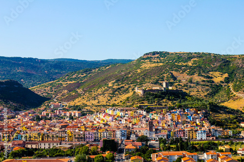 panoramic view of the town of Bosa known for its characteristic colorful houses, Sardinia, Italy