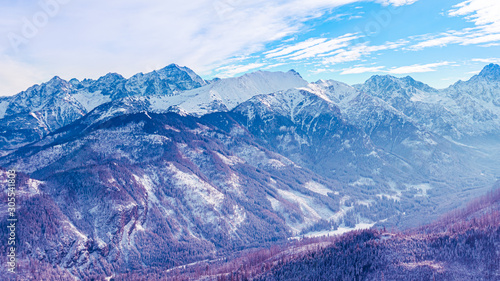 Surreal mountain landscape, purple mountains covered with snow, creative concept. photo