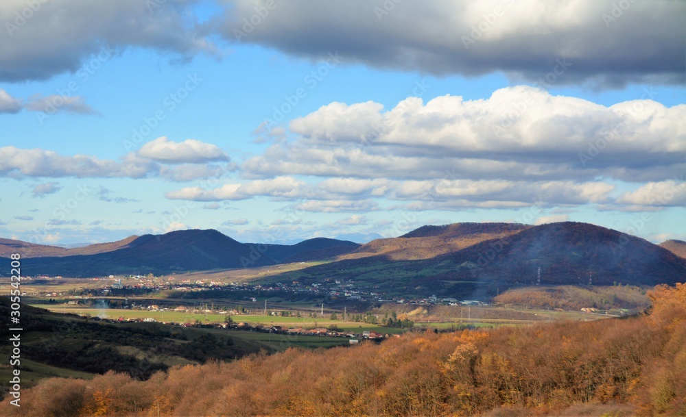 lights and shadows over the hills in the fall