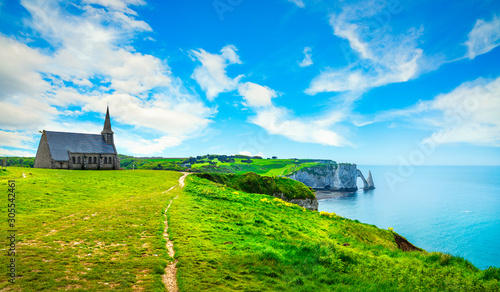 Fotografie Etretat village, Church and Aval cliff. Normandy, France.