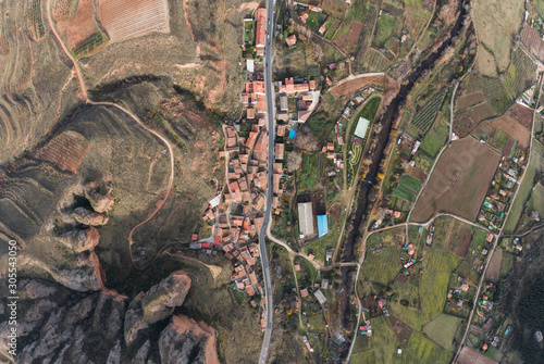 Drone view of rural town and road, in the village of Islallana, La Rioja, Spain photo