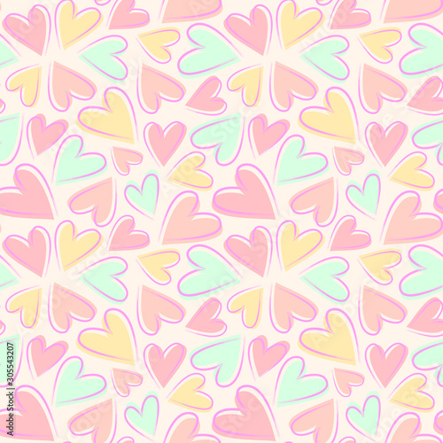 Seamless vector pattern with hearts in pastel colors.