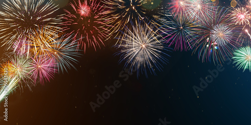 Colorful firework with bokeh background. New Year celebration.