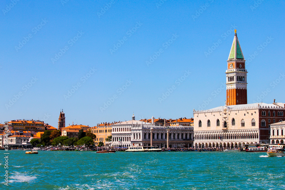 piazza san marco with bell tower and ducal palace seen from the lagoon of venice, italy