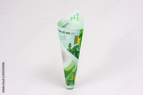 A hundred euro banknote rolled in the shape of a cone