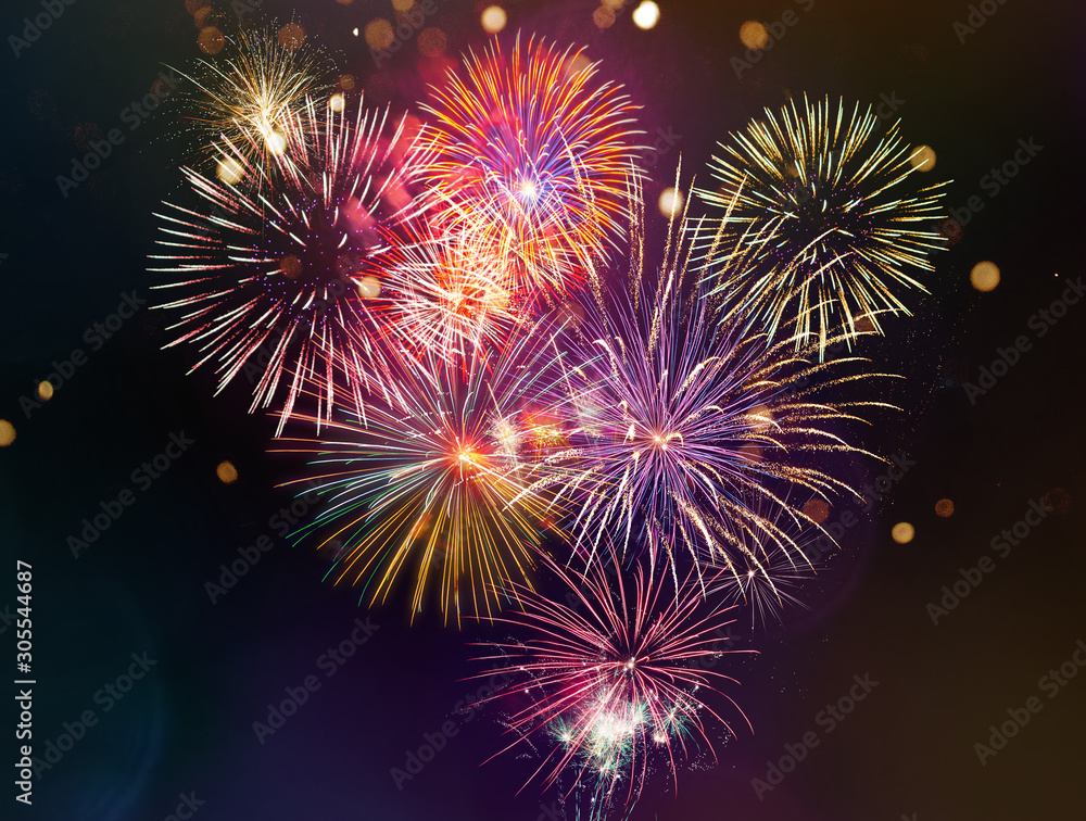 Colorful firework with bokeh background. New Year celebration.