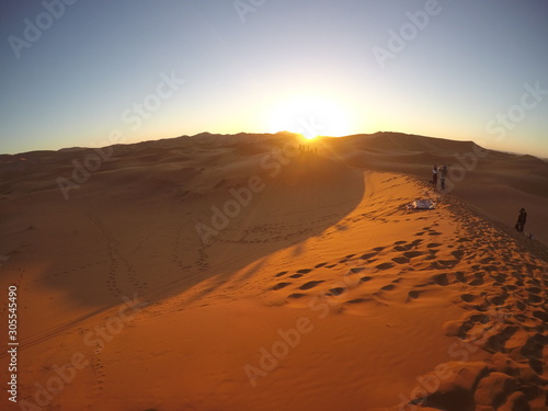 Beautiful sunrise in the desert of Merzouga in the Erg Chebbi Dunes. Morocco