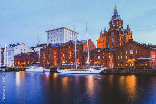 Evening scenery of Uspenski Orthodox Cathedral Church in Katajanokka district of the Old Town in Helsinki, Finland photo