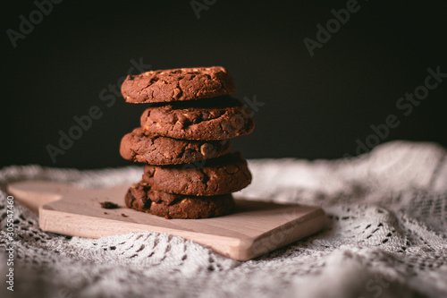 Fotobehang Delicious homemade chocolate cookies on a wooden table