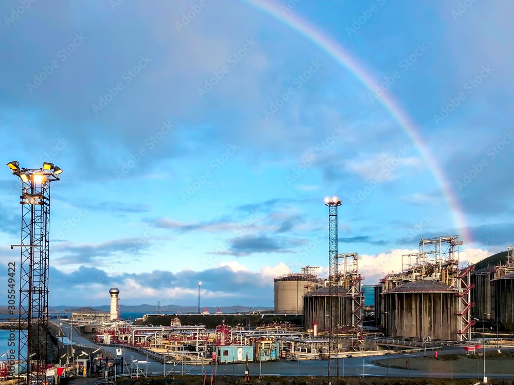 Beautiful rainbow over gas terminal. 