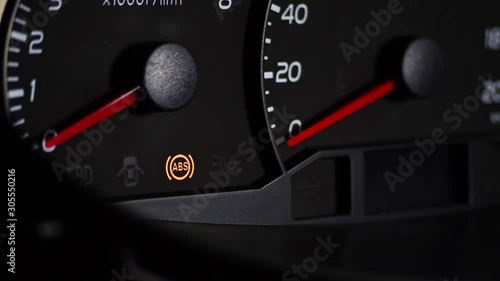 ABS warning light in car dashboard