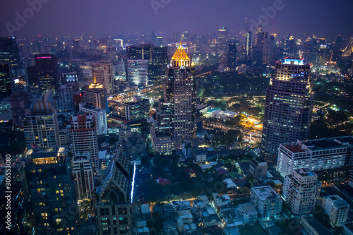The enlightened skyscrapers of Bangkok skyline during night in Thailand