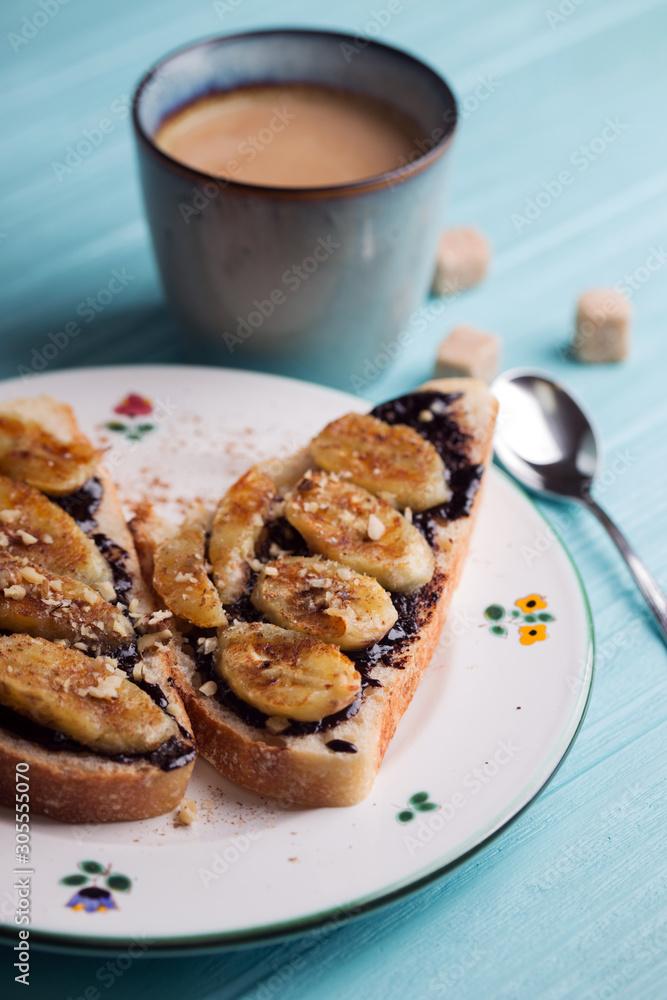 toast with chocolate paste and banana toast with chocolate paste and banana