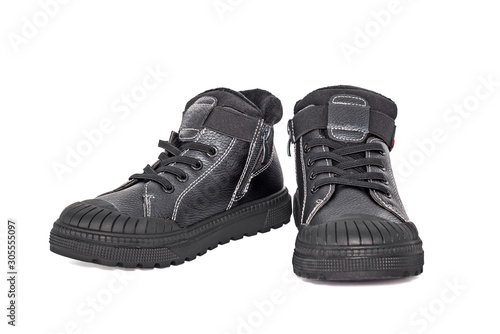 Man's leather black boots isolated on a white background