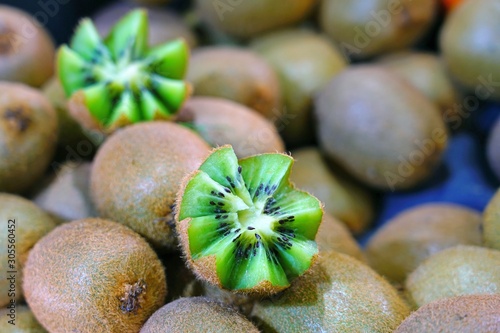 Kiwi fruit cut in half with zig-zag edges