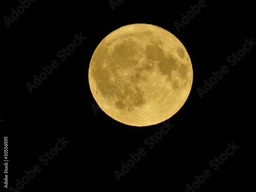 full moon in a dark sky