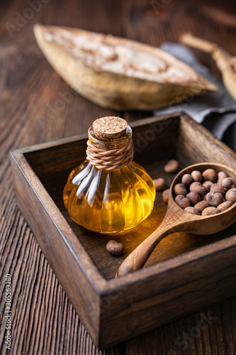 Baobab seed oil in glass bottle for healthy skin and hair