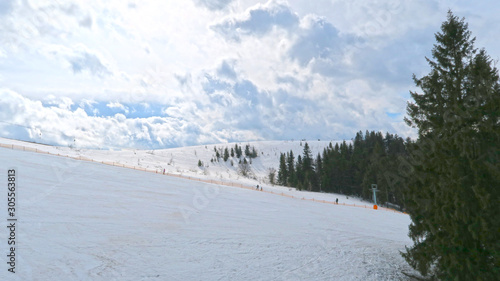 wonderful snowy mountain landscape in early spring