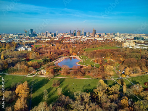 A beautiful panoramic view of the sunset in a fabulous November autumn evening at sunset from drone at Pola Mokotowskie in Warsaw  Poland - Mokotow Field is a large park called  Jozef Pilsudski Park 