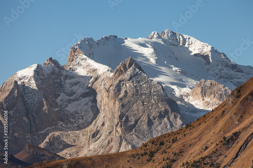 Marmolada mount is the highest peak in the Italian Dolomites with its characteristic perennial glacier on the northern face photo