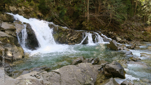 stormy river in the autumn landscape