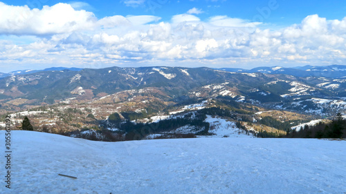 wonderful snowy mountain landscape in early spring