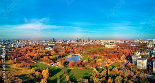 A beautiful panoramic view of the sunset in a fabulous November autumn evening at sunset from drone at Pola Mokotowskie in Warsaw, Poland - Mokotow Field is a large park called "Jozef Pilsudski Park" © udmurd