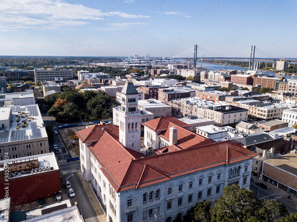 Aerial view of the downtown area of Savannah, Georgia with bridge in the distance.
