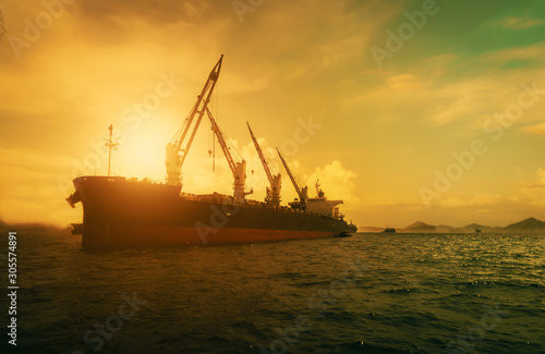 Silhouette Logistics and transportation of International Container Cargo ship in the ocean at Sunshine sky, Freight Transportation, Shipping