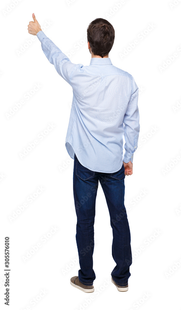 Back view of a man showing thumb up. Back view of a man showing thumb up.