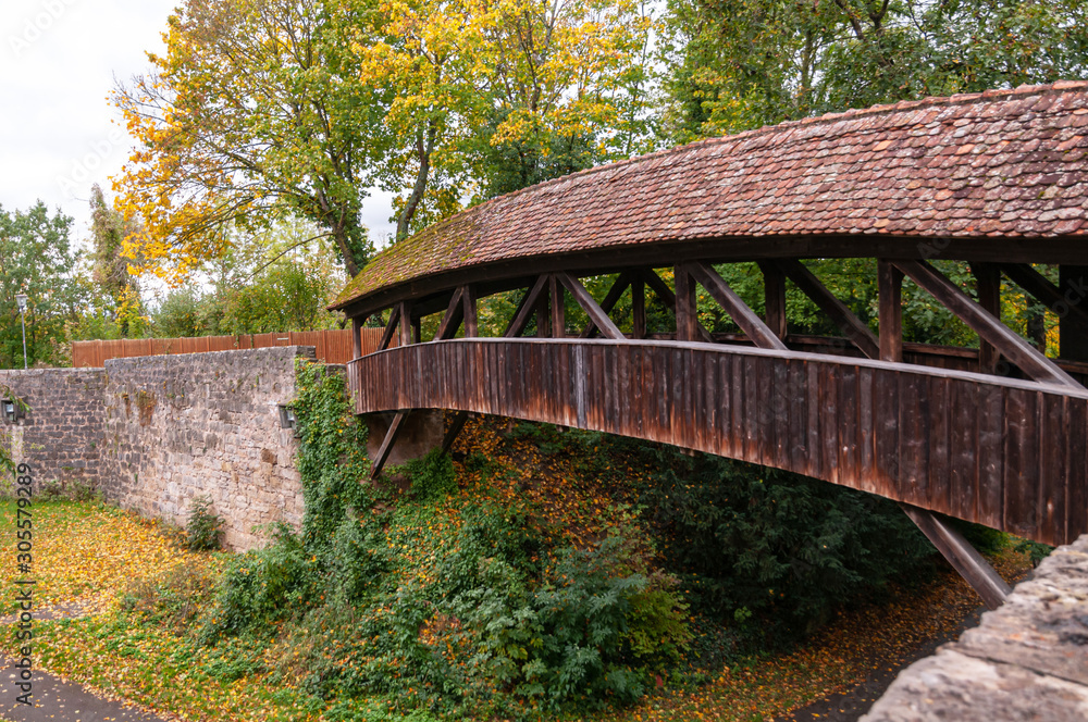 old wooden half-timbered covered Bridge in Rothenburg Ob Der Tauber old wooden half-timbered covered Bridge in Rothenburg Ob Der Tauber