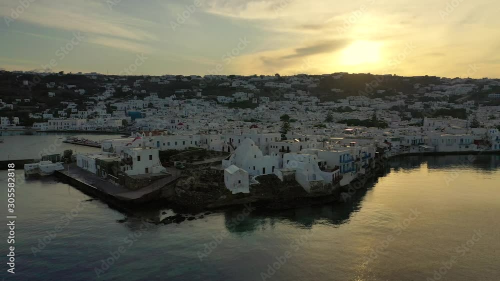 Aerial drone video of picturesque little Venice in main village of Mykonos island at sunrise with beautiful colours, Cyclades, Greece Aerial drone video of picturesque little Venice in main village of Mykonos island at sunrise with beautiful colours, Cyclades, Greece