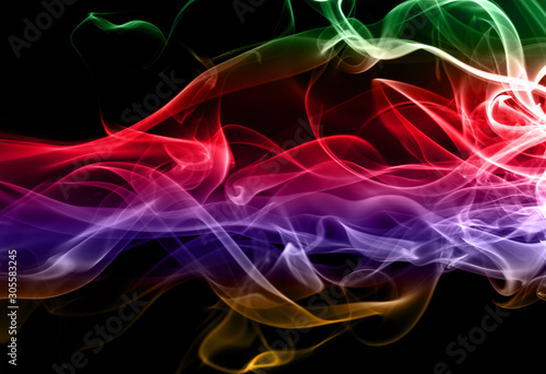 Beautiful colorful smoke abstract on black background, Movement of fire design