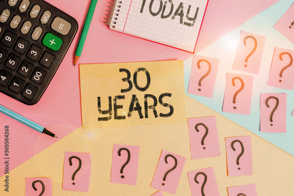 Conceptual hand writing showing 30 Years. Concept meaning Remembering or honoring special day for being 30 years in existence Mathematics stuff and writing equipment on pastel background Conceptual hand writing showing 30 Years. Concept meaning Remembering or honoring special day for being 30 years in existence Mathematics stuff and writing equipment on pastel background