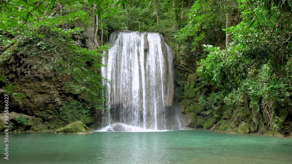 Erawan waterfall level three in National Park, famous tourist destination in Kanchanaburi, Thailand. Erawan waterfall level three in National Park, famous tourist destination in Kanchanaburi, Thailand.