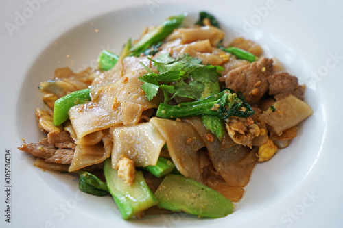 Pad See Ew, Stir fried noodles with black soy sauce and pork