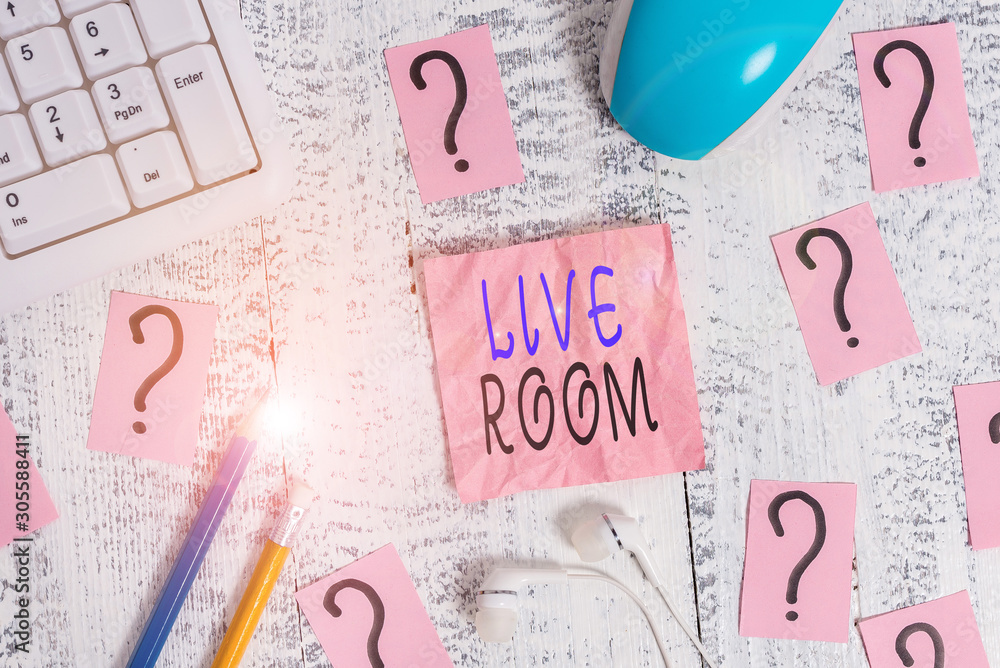 Conceptual hand writing showing Live Room. Concept meaning the room in a house or apartment that is used for relaxing in Writing tools and scribbled paper on top of the wooden table Conceptual hand writing showing Live Room. Concept meaning the room in a house or apartment that is used for relaxing in Writing tools and scribbled paper on top of the wooden table